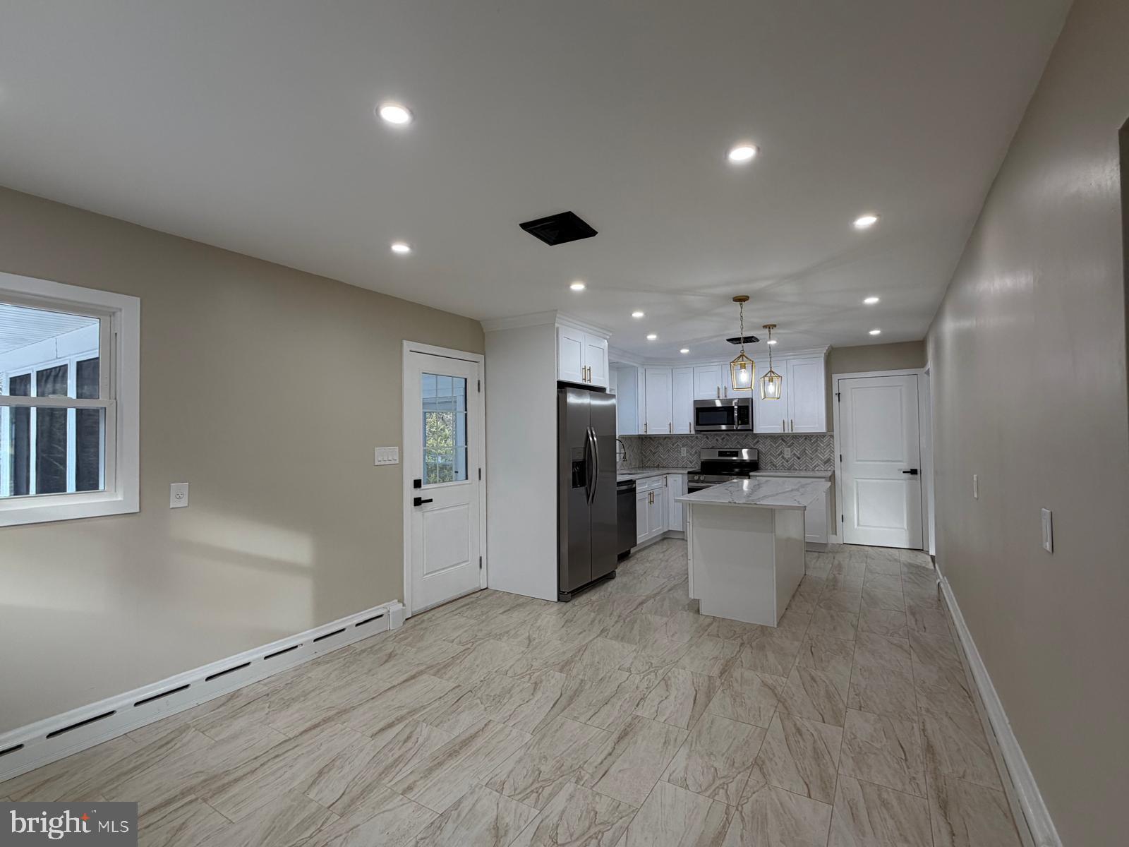 24 Rieck Avenue Millville, NJ 08332 - Photo 8 of 57 a view of kitchen with refrigerator sink and stove