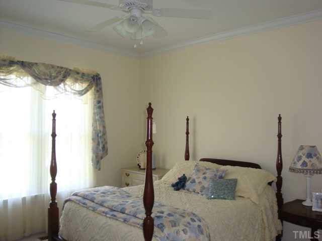 2845 Anfield Road Raleigh, NC 27606 - Photo 11 of 25 Secondary Bedroom on First Floor with Crown Moulding Bedroom