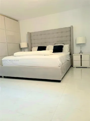 a bathroom with a bathtub and a table