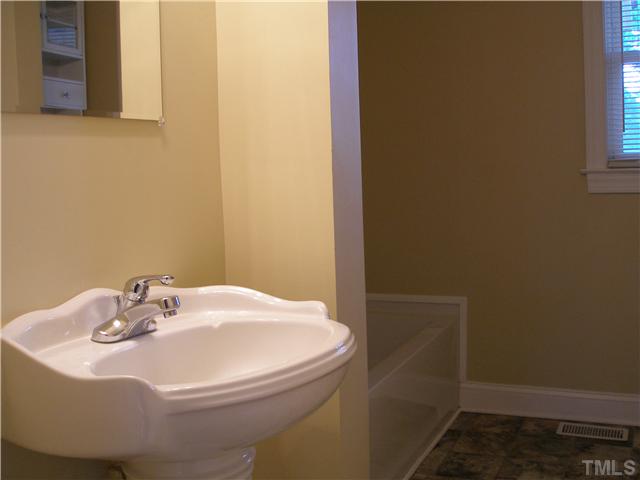 4119 Rock Quarry Road Raleigh, NC 27610 - Photo 7 of 12 Both bathrooms have been fully updated and renovated