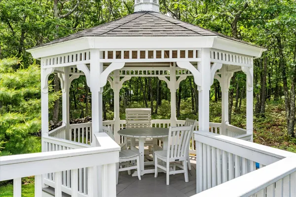 a front view of a house with a porch