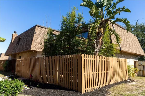 a view of a wooden fence