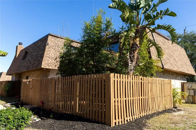 a view of a wooden fence