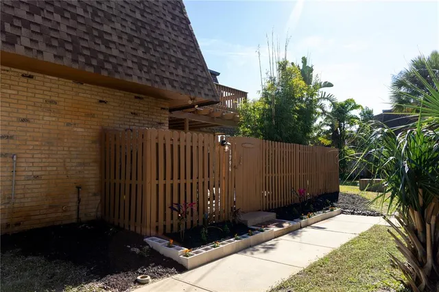 a view of a backyard of the house