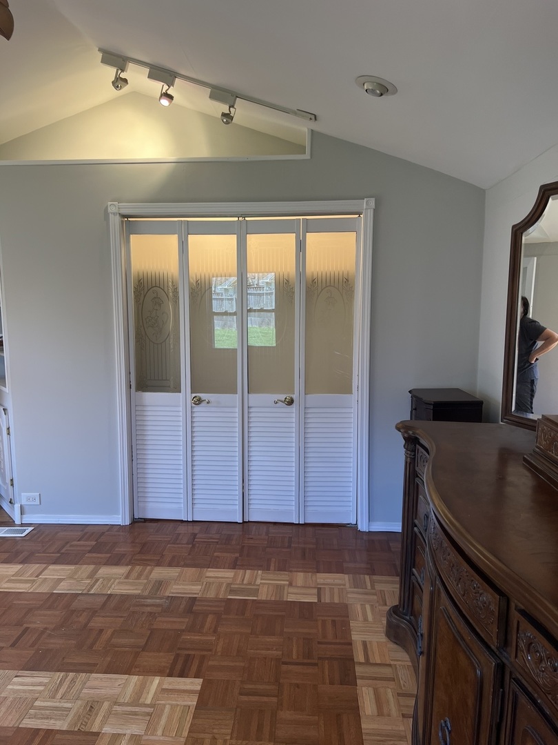 207 Second Street Elgin, IL 60123 - Photo 12 of 23 a view of a bathroom with a sink and a mirror