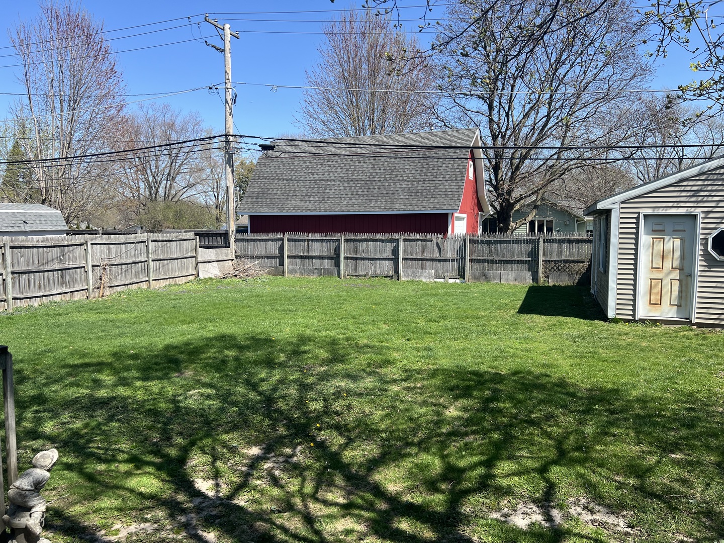 207 Second Street Elgin, IL 60123 - Photo 23 of 23 a view of a house with a yard and sitting area