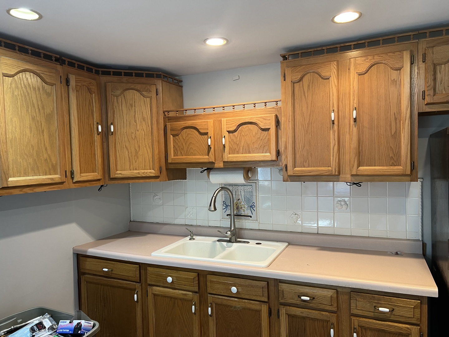 207 Second Street Elgin, IL 60123 - Photo 9 of 23 a kitchen with stainless steel appliances granite countertop a sink a stove and cabinets