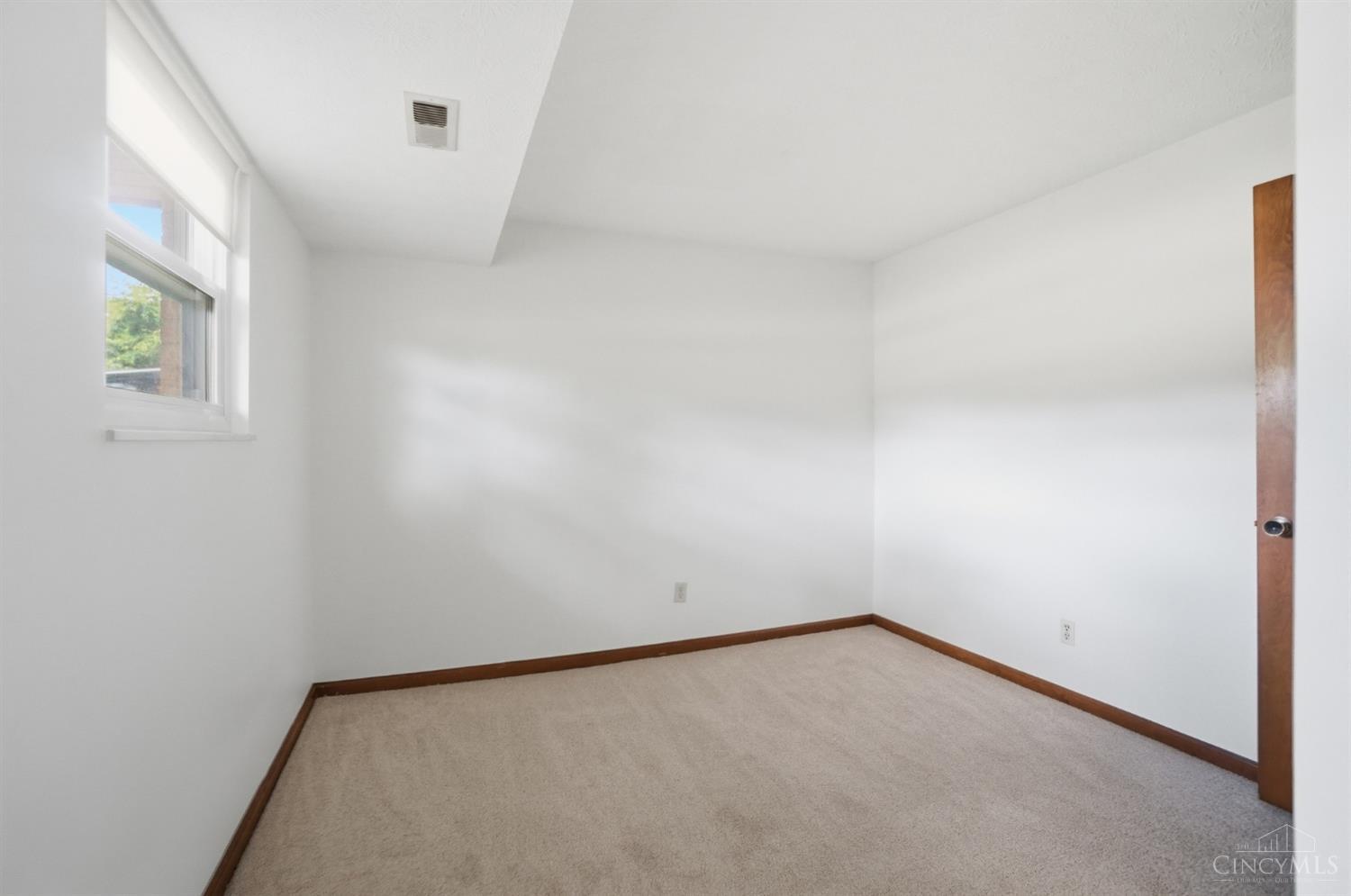 2905 Resor Road Fairfield, OH 45014 - Photo 29 of 68 Private lower-level bedroom adds flexibility for guests, work-from-home space, or additional living needs.