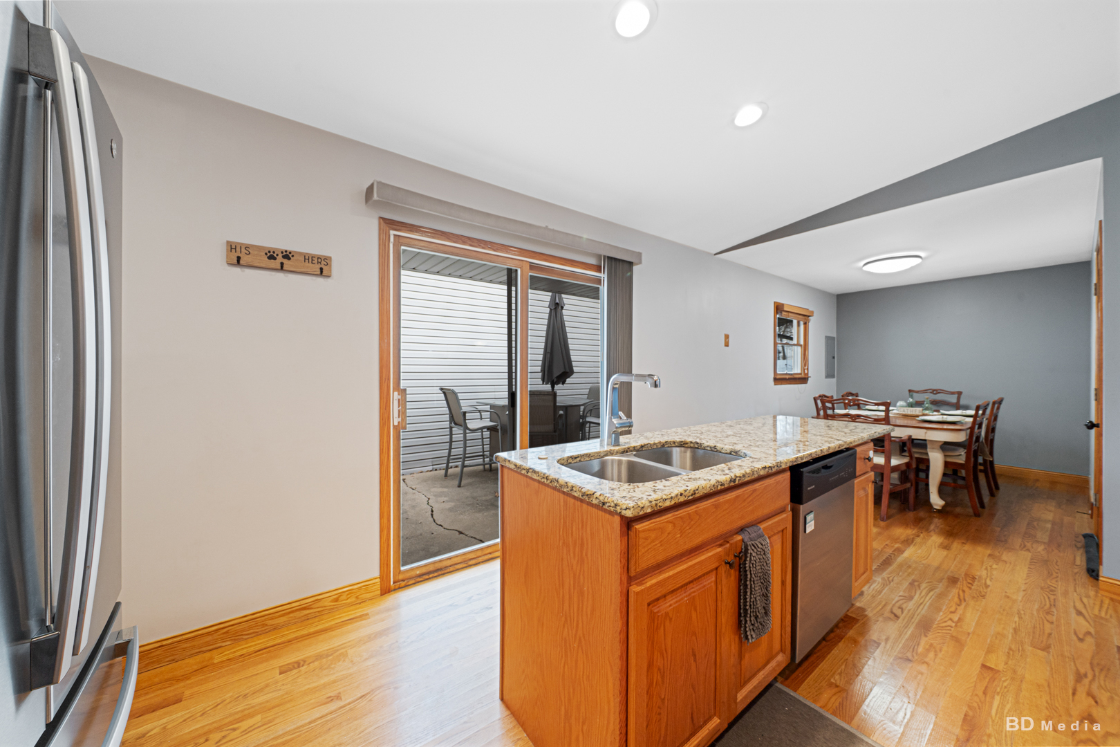709 Cascade Avenue Romeoville, IL 60446 - Photo 11 of 23 a room with furniture a wooden floor and a window