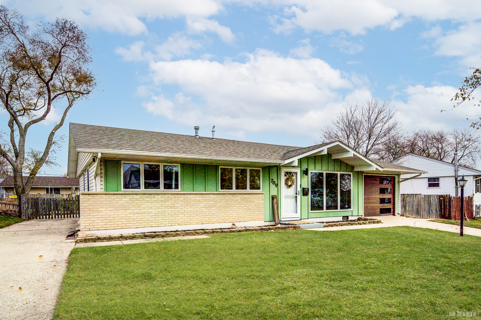 709 Cascade Avenue Romeoville, IL 60446 - Photo 5 of 23 a front view of a house with a yard