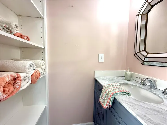 an aerial view of a house with a lake view