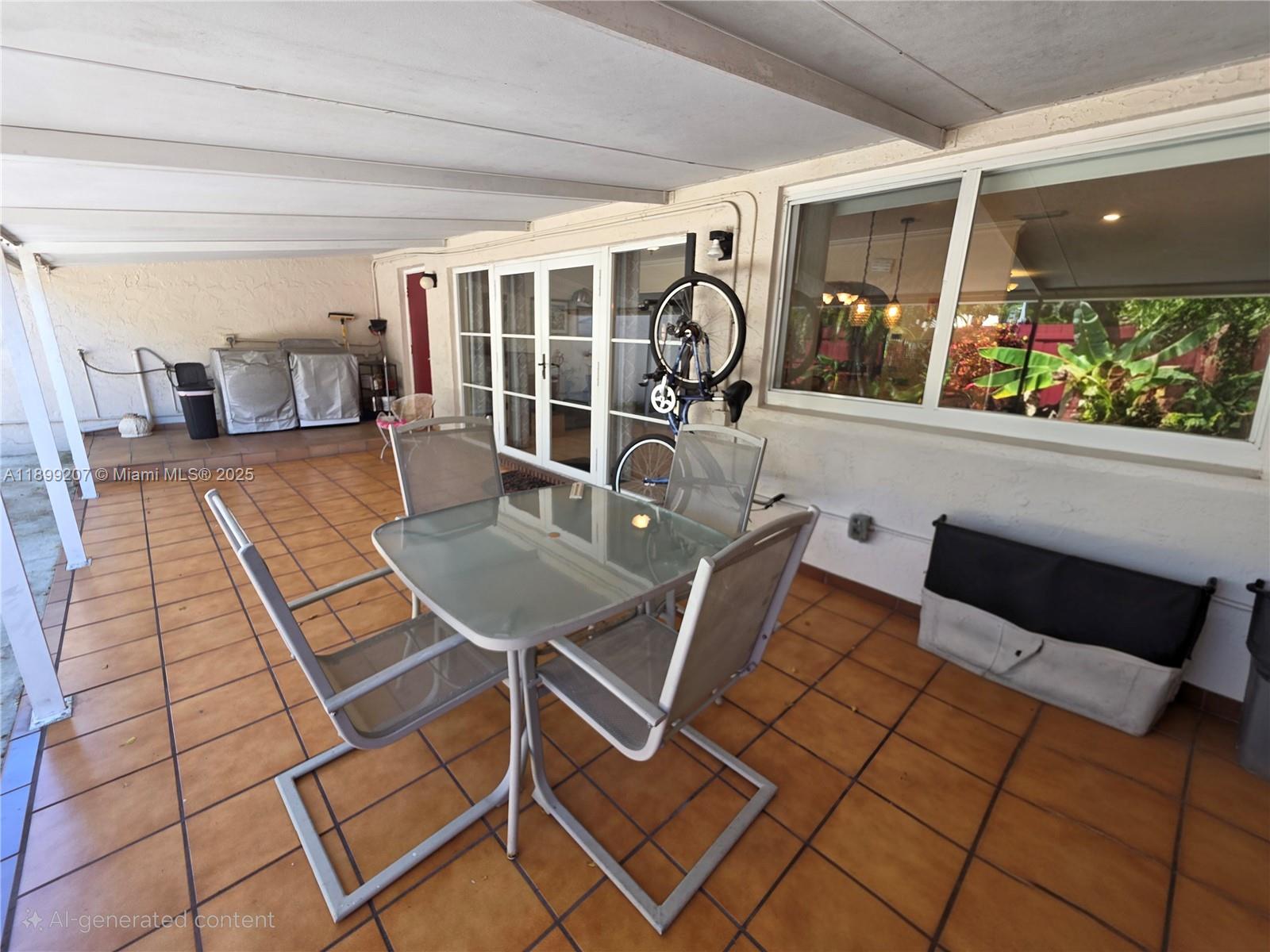 6923 Holly Road Miami Lakes, FL 33014 - Photo 17 of 23 a view of a dining room with furniture and a floor to ceiling window