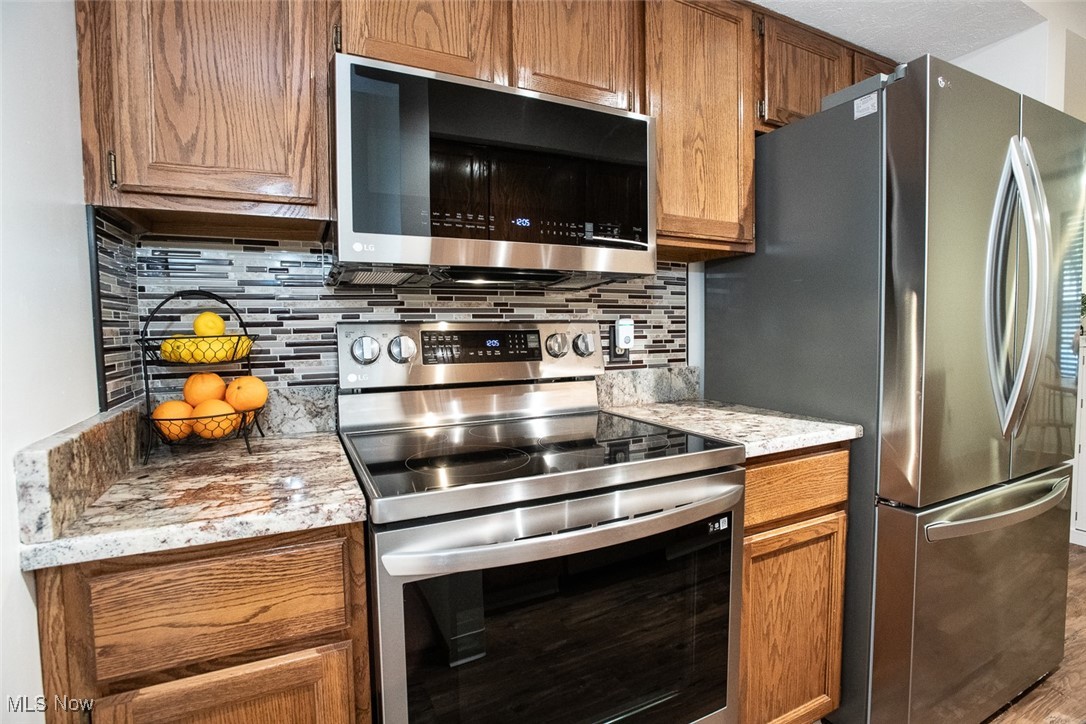 30051 Center Ridge Road, Unit B Westlake, OH 44145 - Photo 8 of 32 Kitchen newer granite and appliances