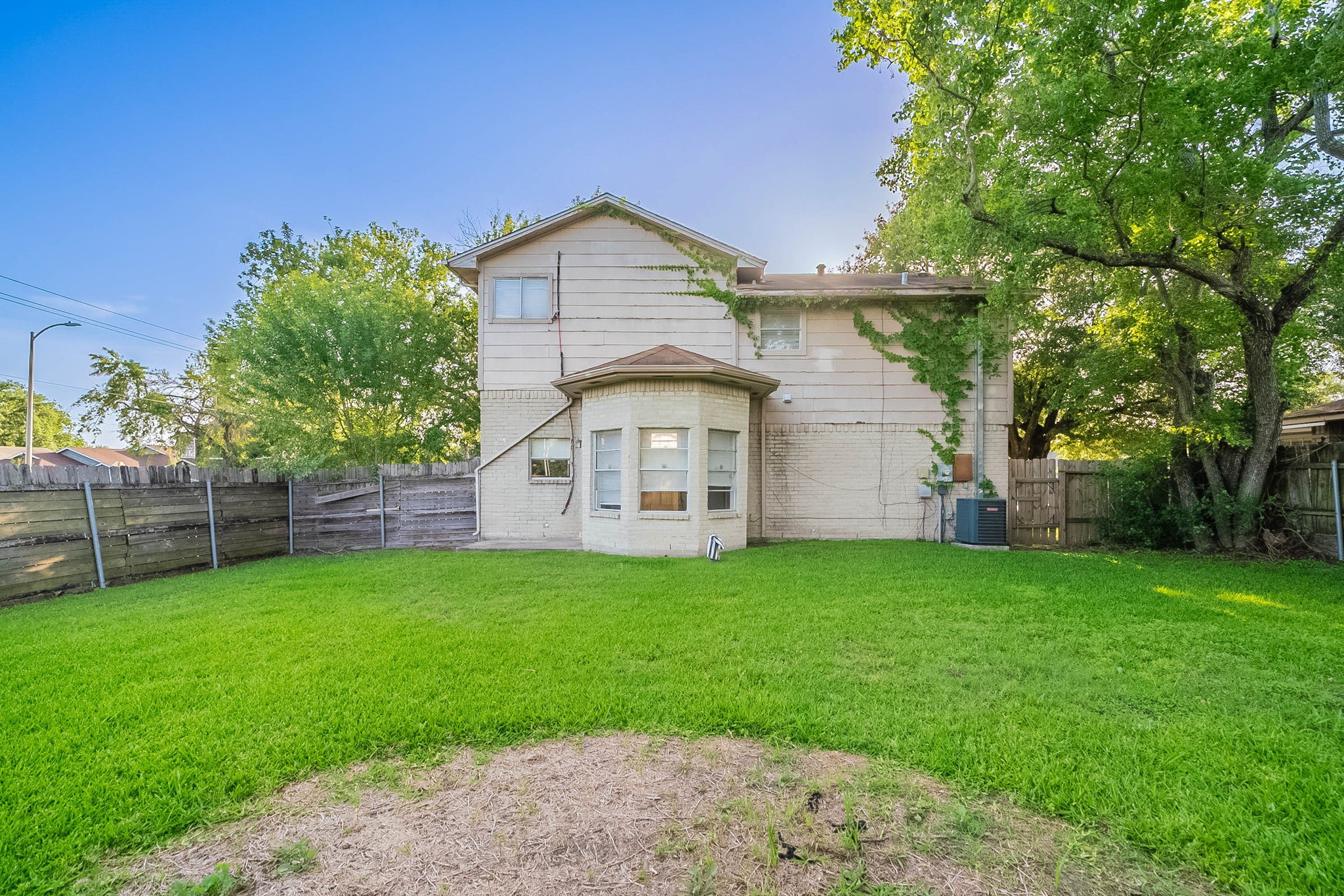 1502 Stevenage Lane Channelview, TX 77530 - Photo 29 of 33 a view of a house with a yard