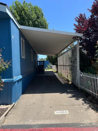 a car parked in front of a house