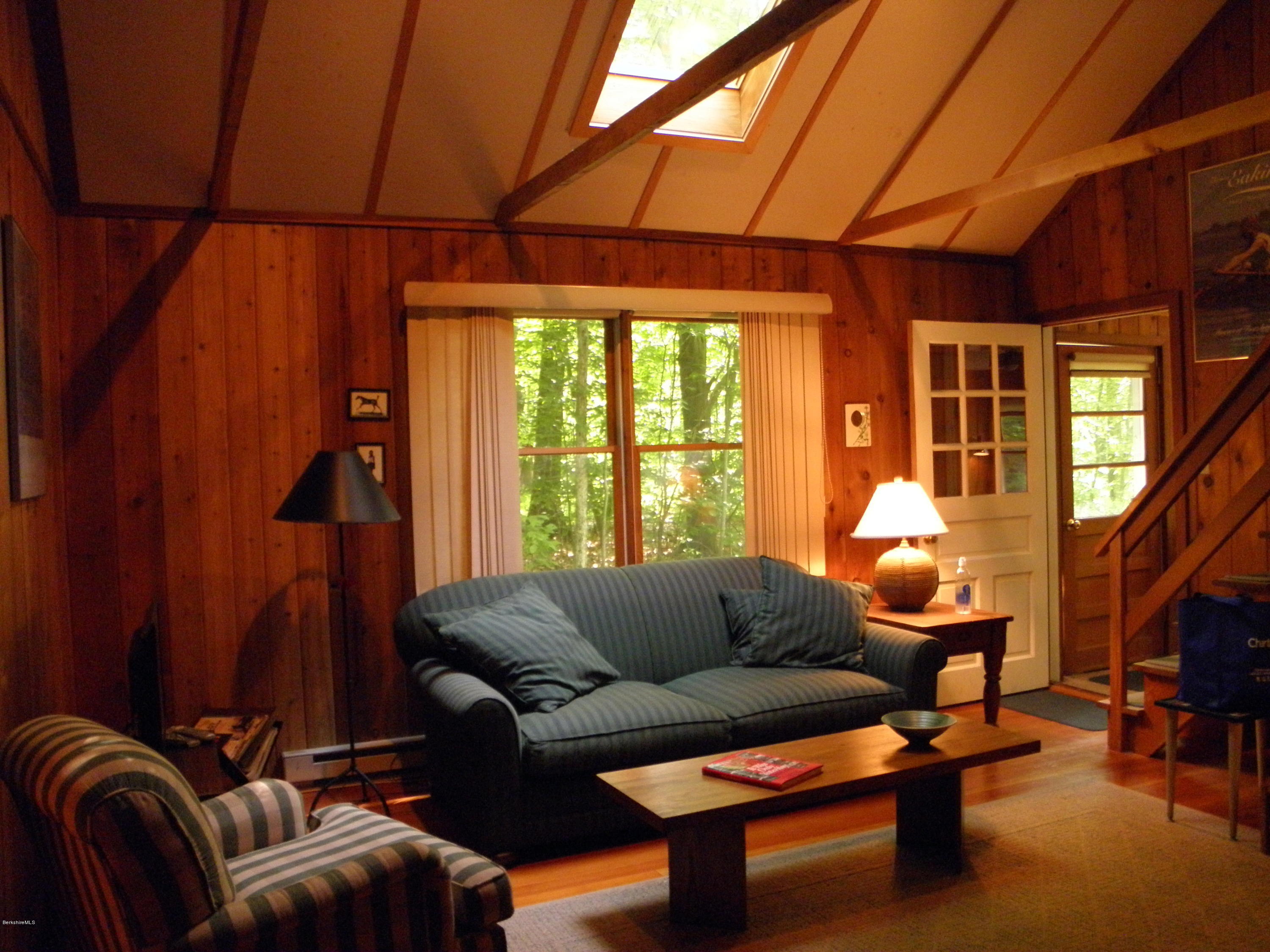 living room with skylight