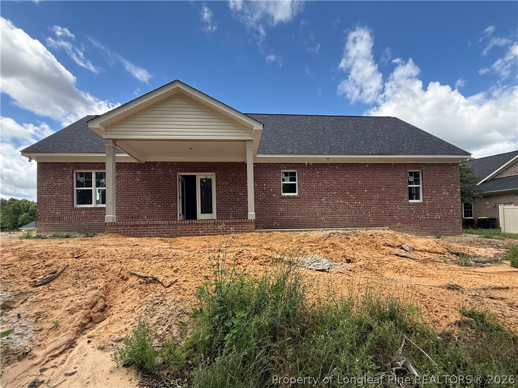 154 Ridge Stone Drive Autryville, NC 28318 - Photo 17 of 17 a front view of a house with a yard