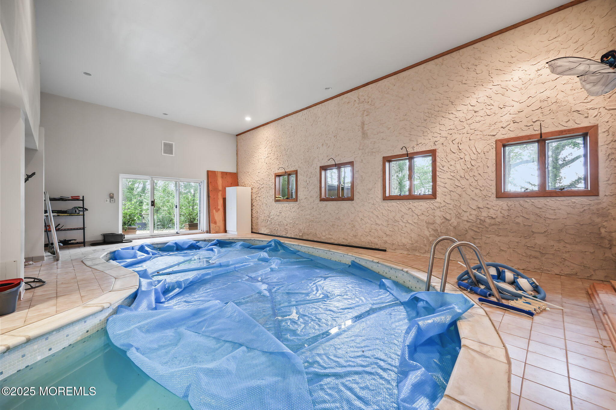 10 West Riverside Drive Brick, NJ 08723 - Photo 18 of 66 a bed room with a bed and a chair