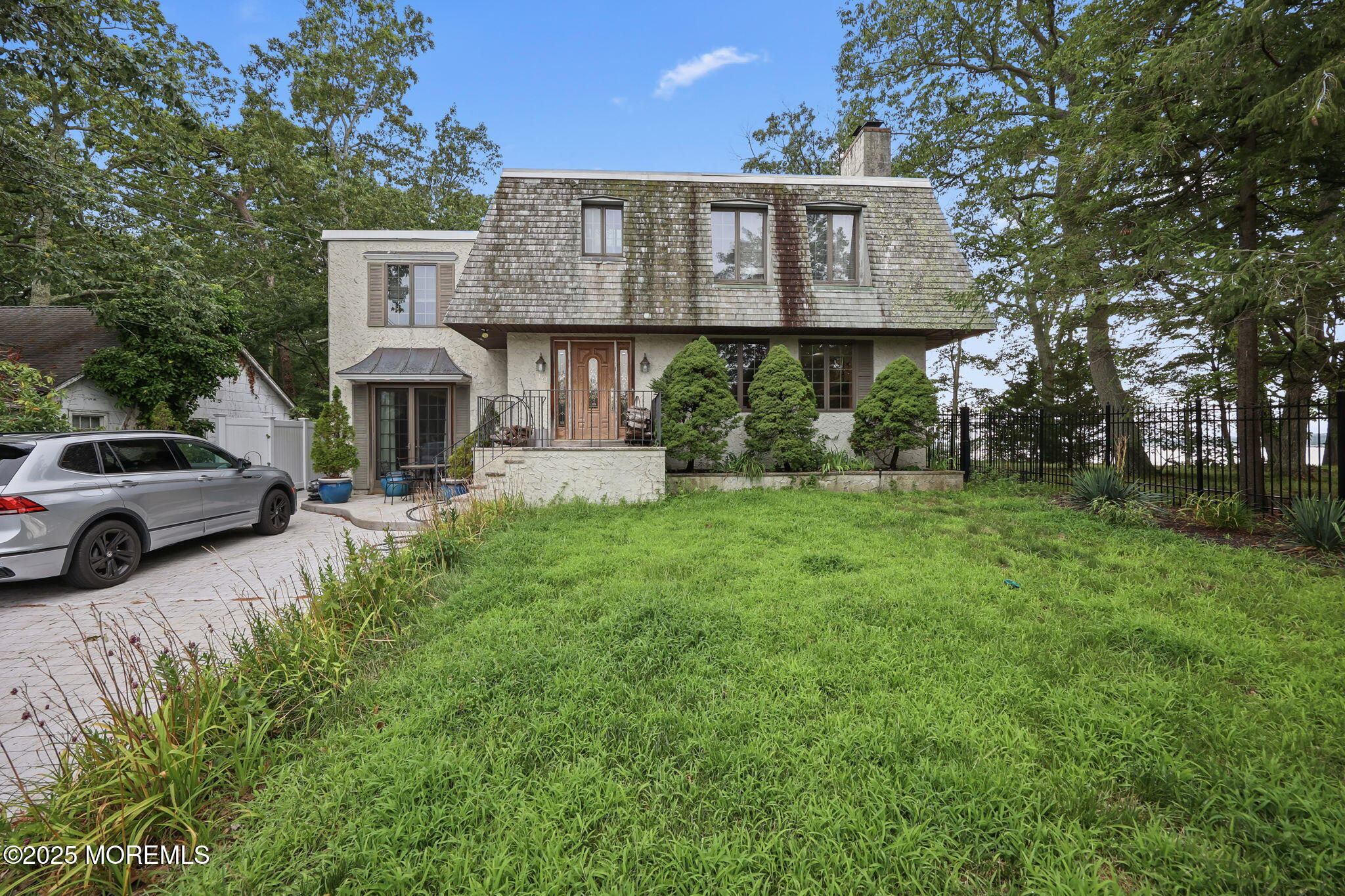 10 West Riverside Drive Brick, NJ 08723 - Photo 3 of 66 a view of a house with a yard