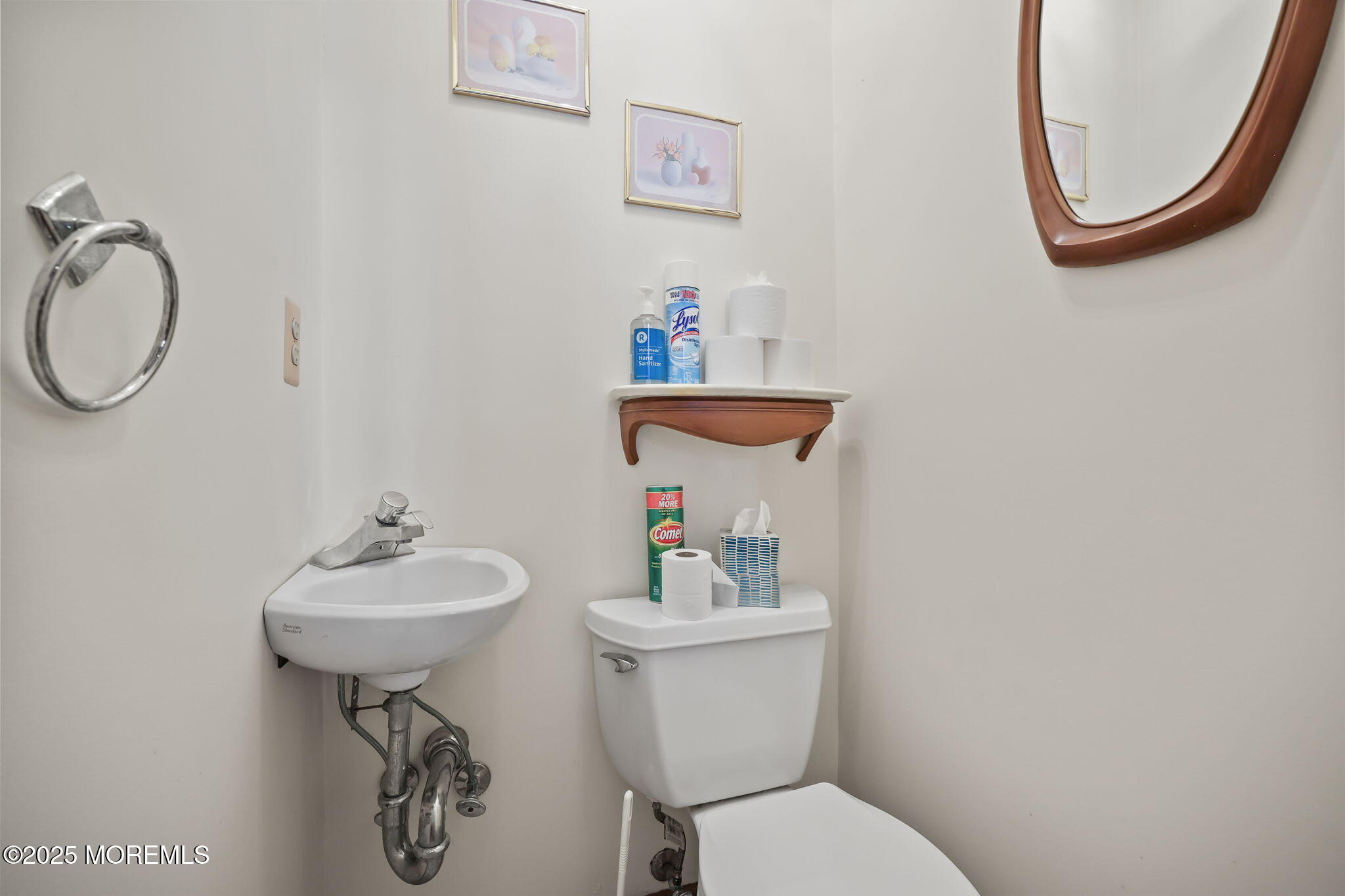 10 West Riverside Drive Brick, NJ 08723 - Photo 37 of 66 a bathroom with a sink mirror and toilet
