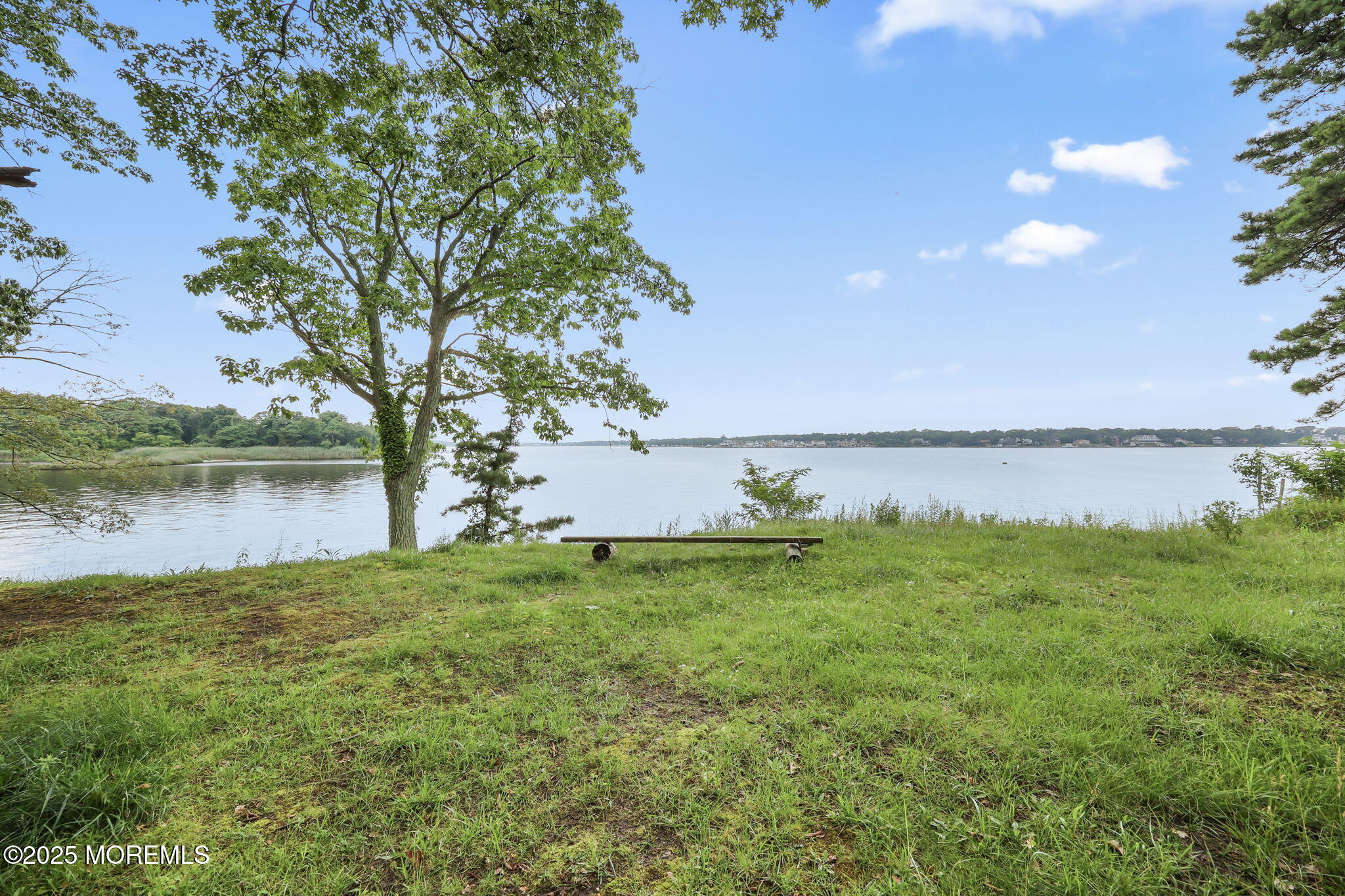 10 West Riverside Drive Brick, NJ 08723 - Photo 49 of 66 a view of a big yard with an outdoor space and seating