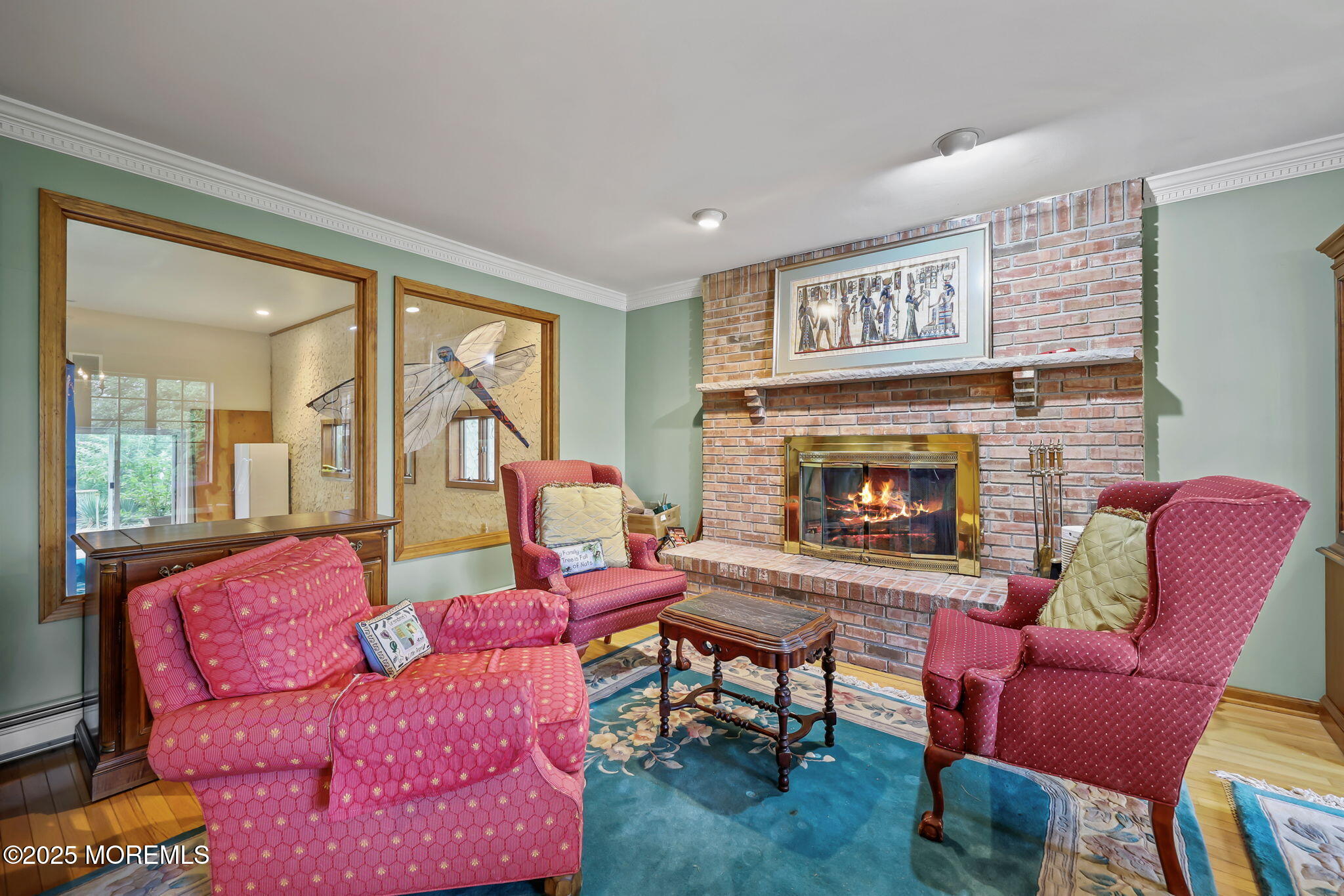 10 West Riverside Drive Brick, NJ 08723 - Photo 7 of 66 a living room with furniture fireplace and a large window