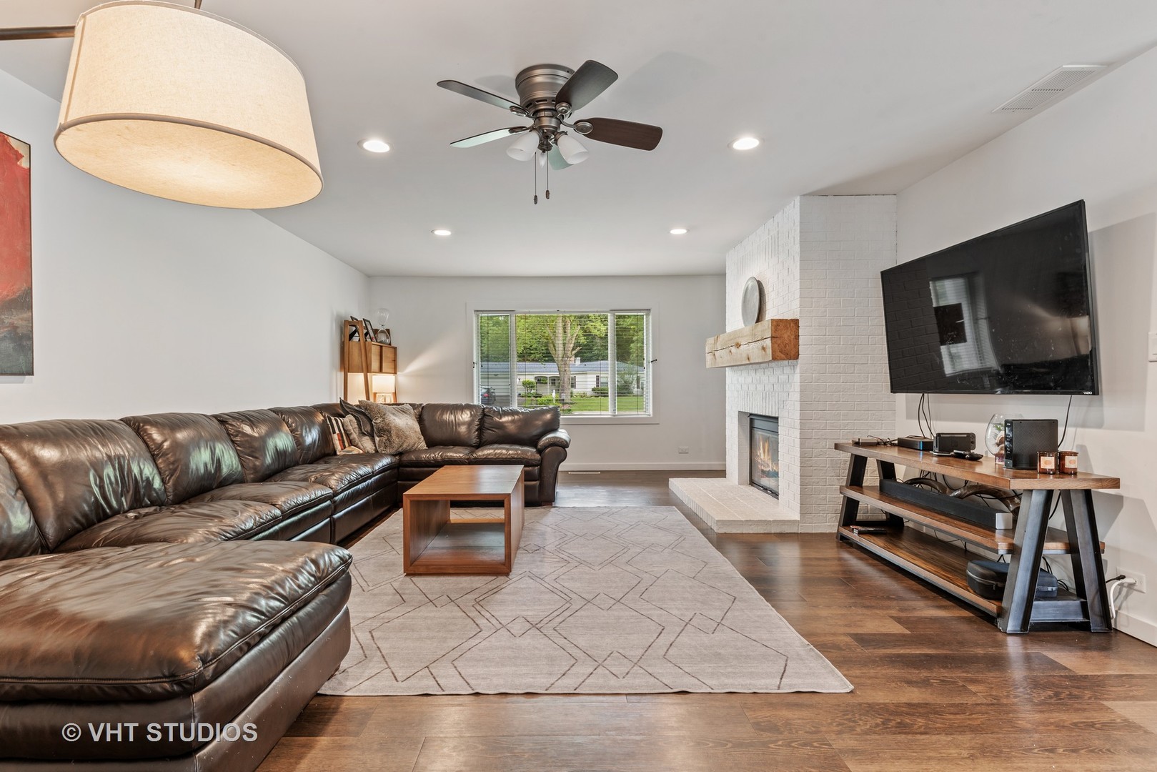 226 Valley Road Trout Valley, IL 60013 - Photo 18 of 32 a living room with furniture and a flat screen tv