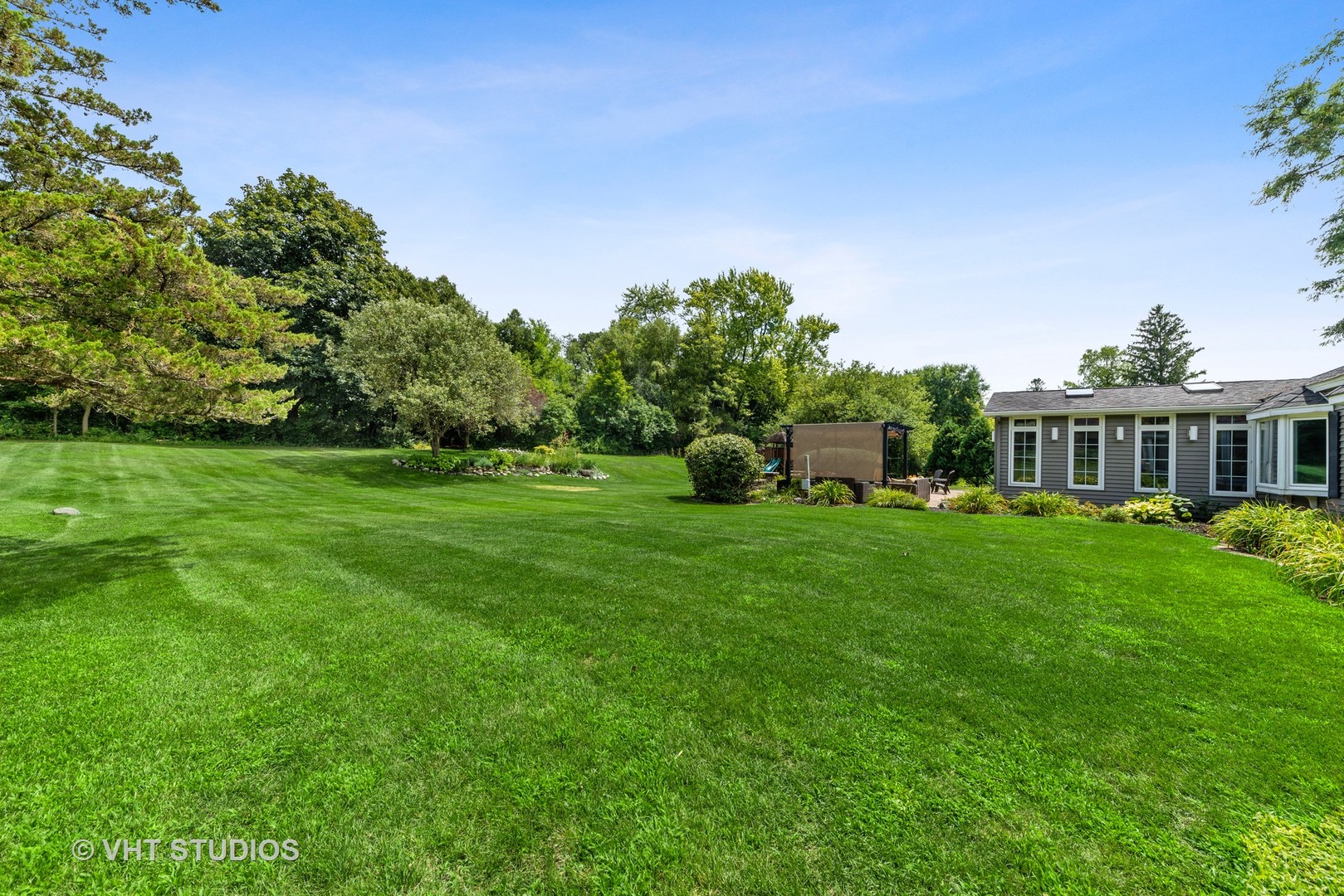 226 Valley Road Trout Valley, IL 60013 - Photo 28 of 32 a front view of a house with garden