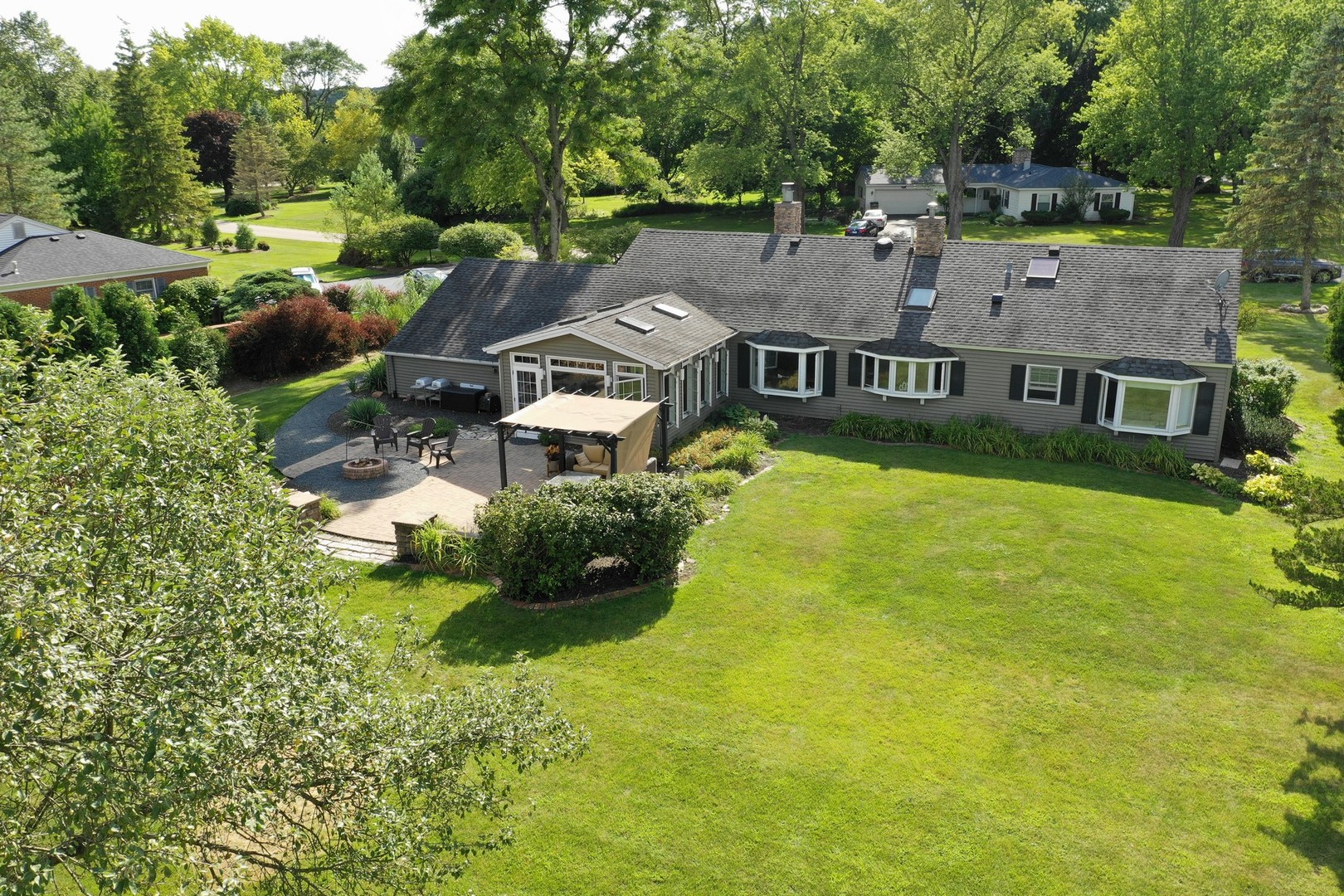 226 Valley Road Trout Valley, IL 60013 - Photo 29 of 32 an aerial view of residential houses with outdoor space and trees