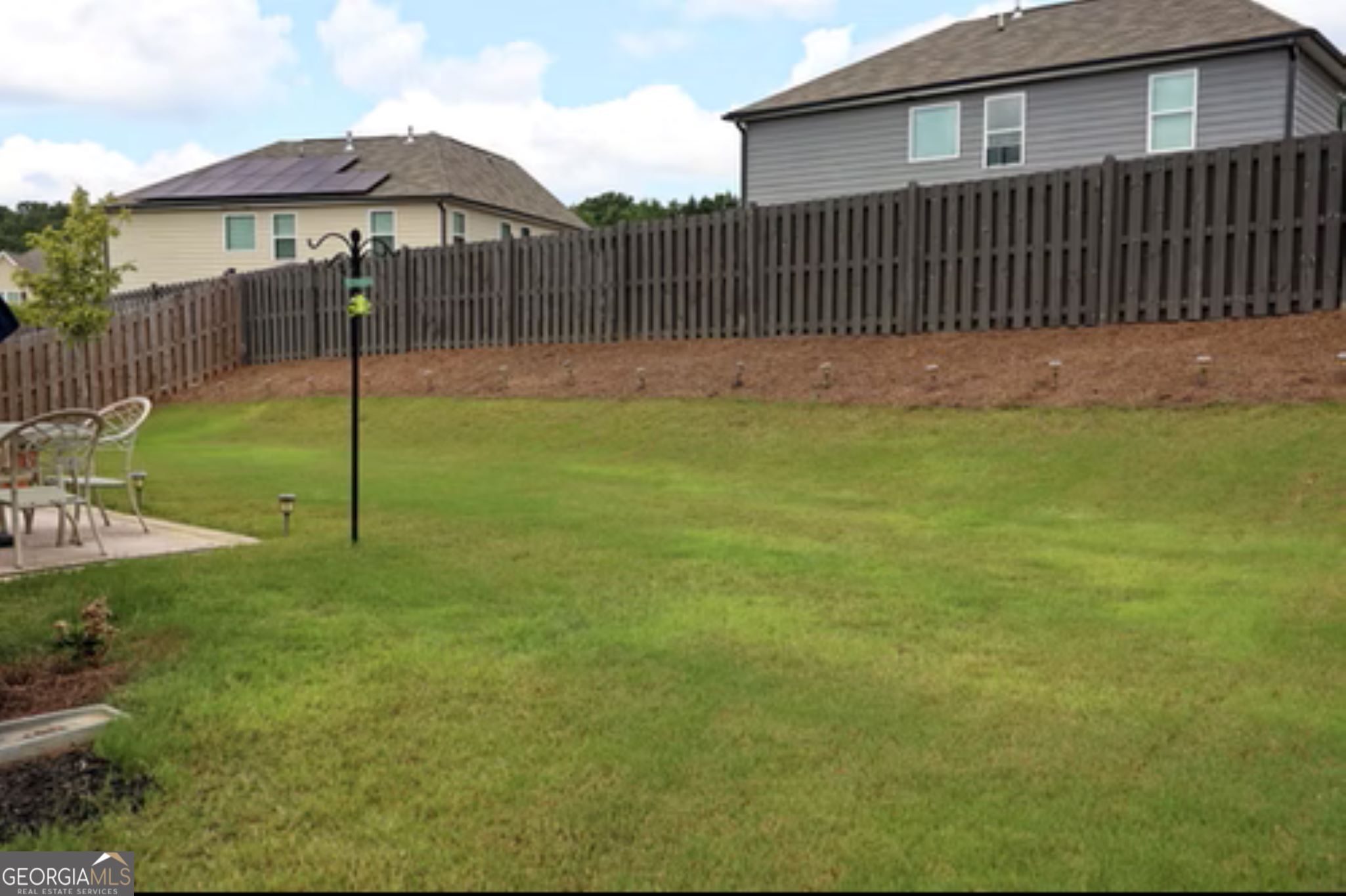 338 Lead Way Jonesboro, GA 30238 - Photo 16 of 17 a backyard of a house with lots of green space