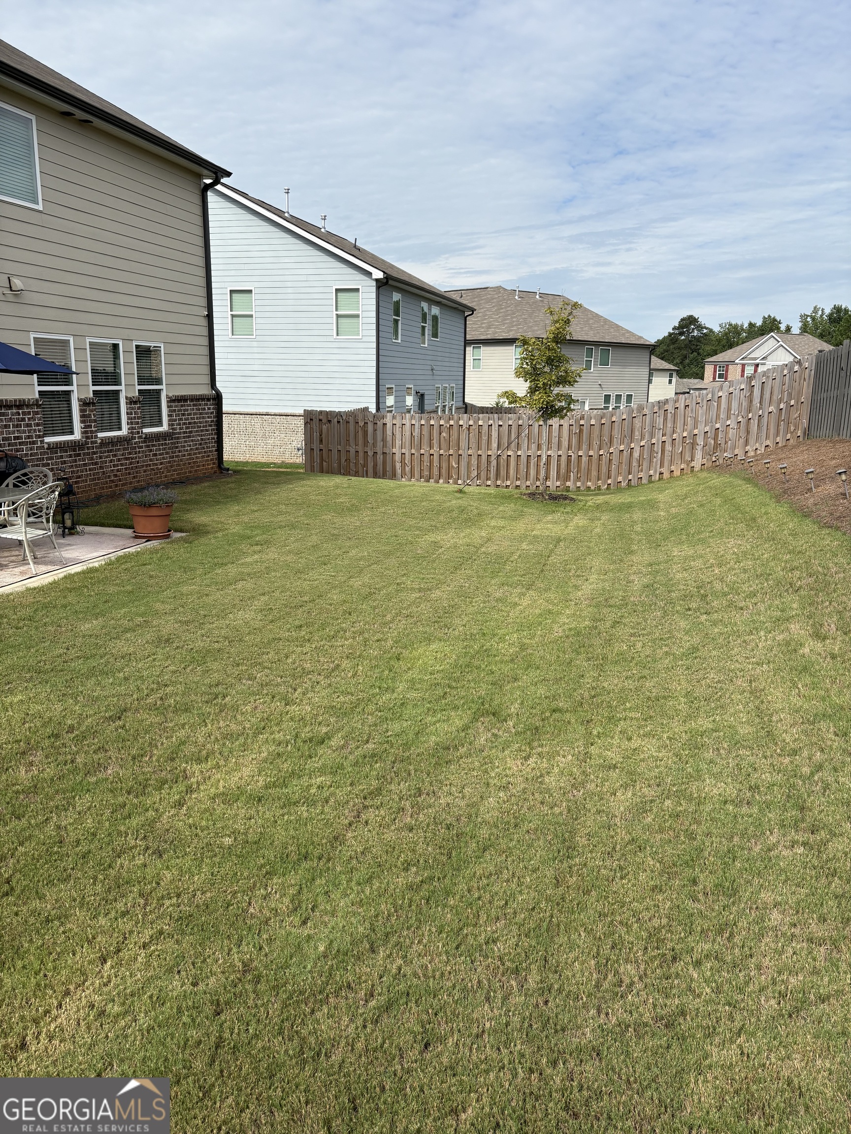 338 Lead Way Jonesboro, GA 30238 - Photo 17 of 17 a view of a house with backyard and porch