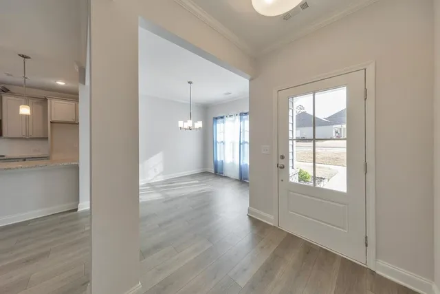 a view of an empty room and window