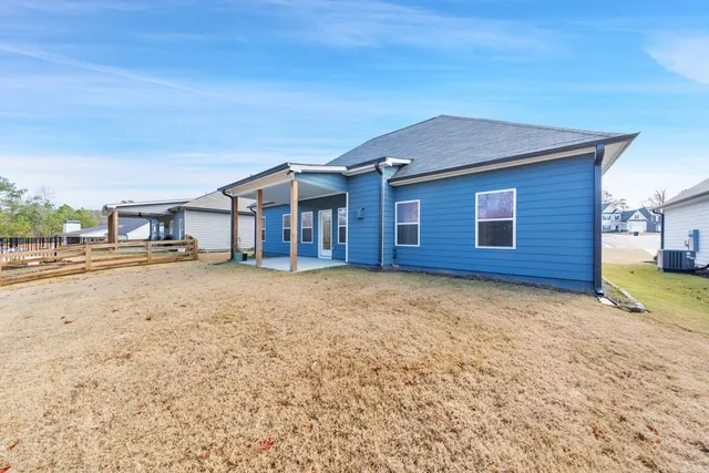 a view of a backyard of a house