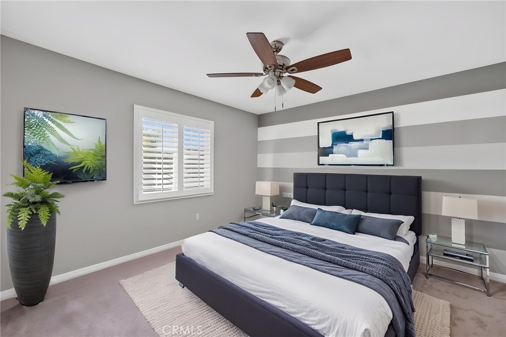 23347 Crystal Way Wildomar, CA 92595 - Photo 67 of 109 a bedroom with a large bed and a window
