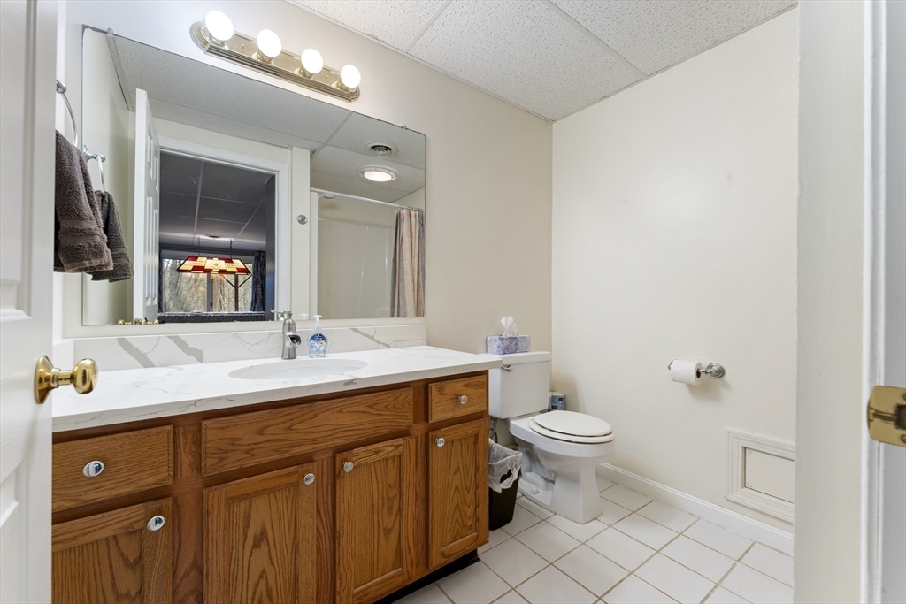 7 Millers Way, Unit C Sutton, MA 01590 - Photo 16 of 28 a bathroom with a sink and a toilet