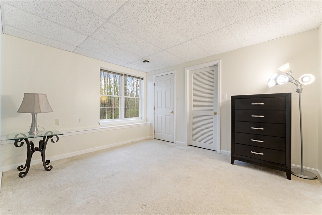 7 Millers Way, Unit C Sutton, MA 01590 - Photo 20 of 28 a view of an empty room with a window