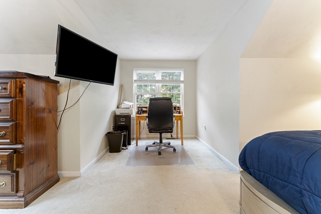 7 Millers Way, Unit C Sutton, MA 01590 - Photo 22 of 28 a view of a workspace with furniture and a window