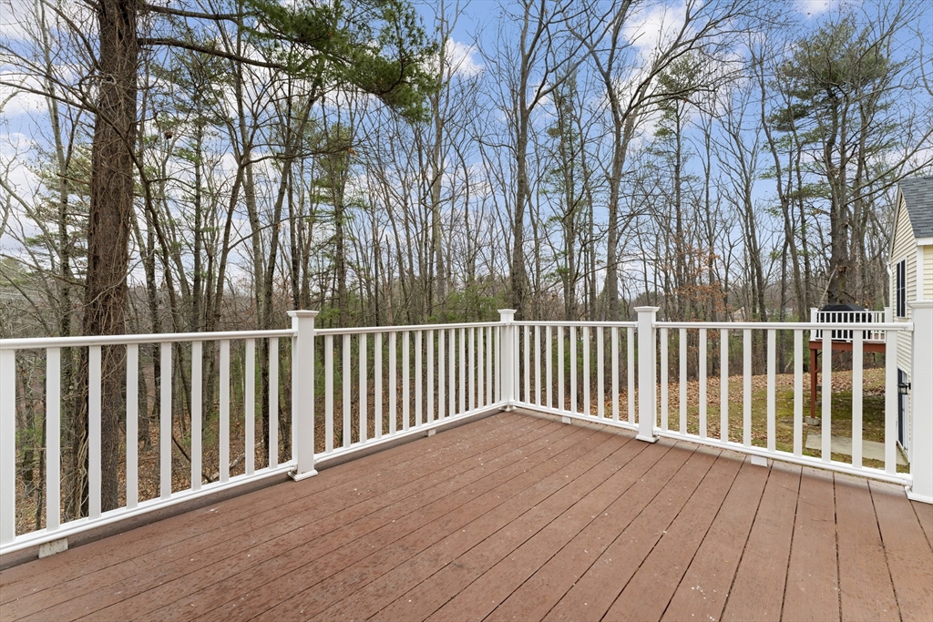 7 Millers Way, Unit C Sutton, MA 01590 - Photo 5 of 28 a view of a wooden fence