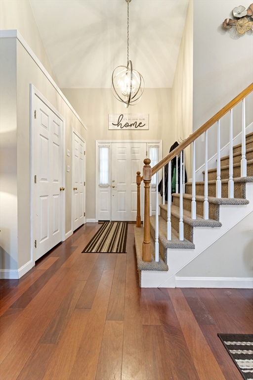 7 Millers Way, Unit C Sutton, MA 01590 - Photo 6 of 28 a view of a room with wooden floor and stairs