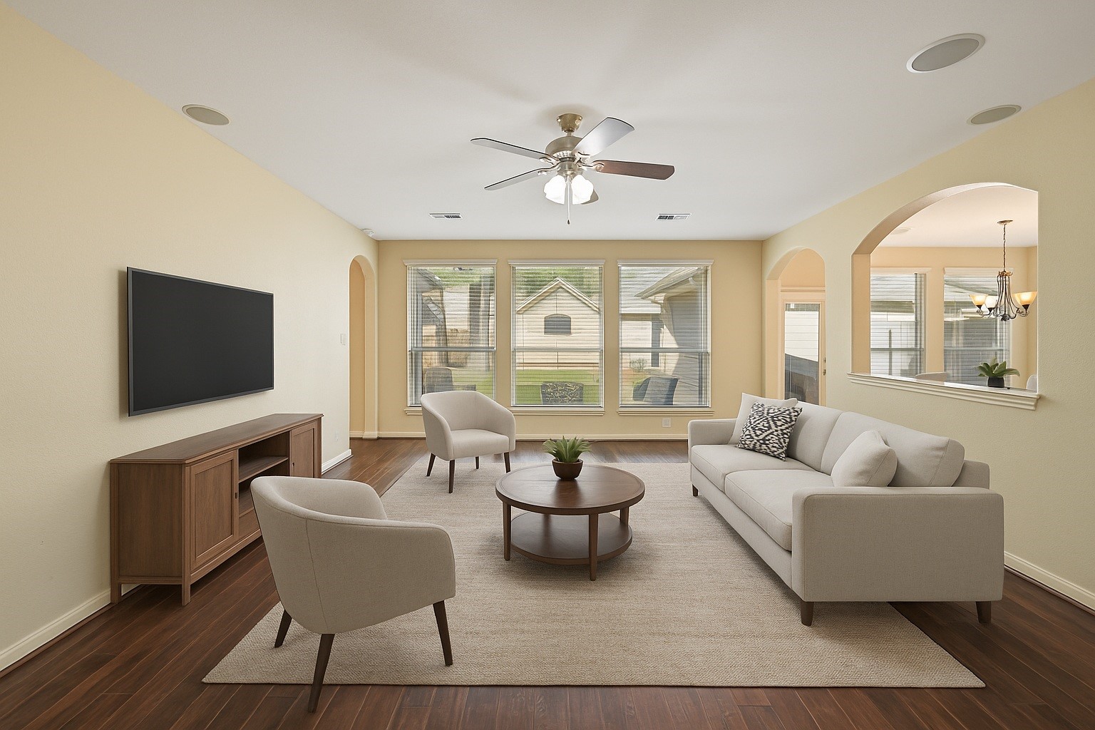 12527 Cape Sable Court Humble, TX 77346 - Photo 14 of 39 a living room with furniture a flat screen tv and a large window