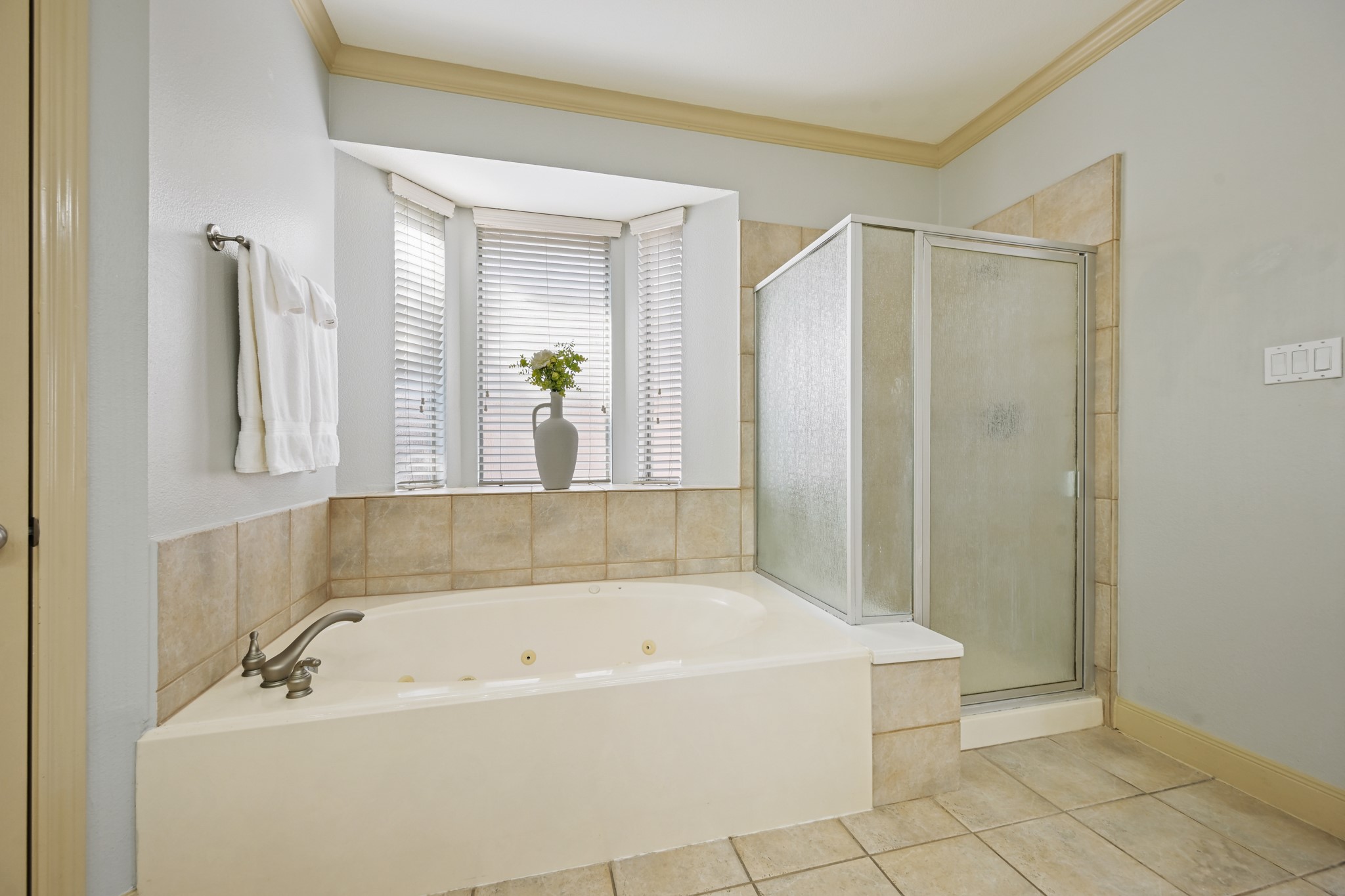 12527 Cape Sable Court Humble, TX 77346 - Photo 26 of 39 a white bath tub sitting next to a bathroom sink