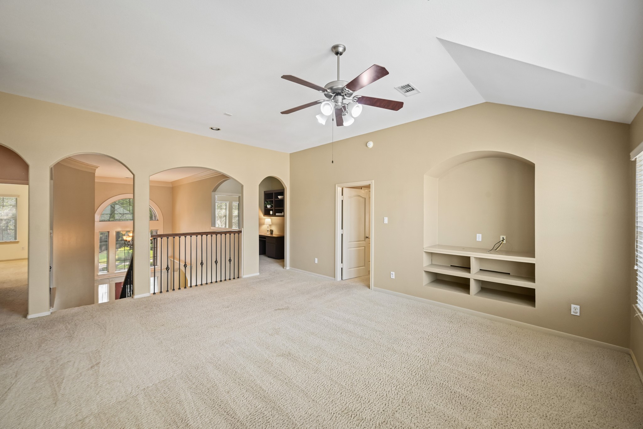 12527 Cape Sable Court Humble, TX 77346 - Photo 29 of 39 a view of empty room with a ceiling fan