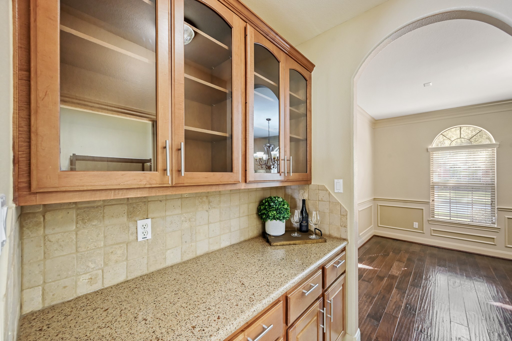 12527 Cape Sable Court Humble, TX 77346 - Photo 5 of 39 a kitchen with granite countertop sink and cabinets