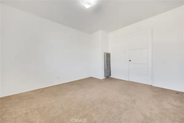 an empty room with an entryway