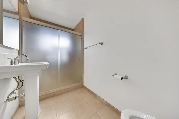 a bathroom with a sink and mirror