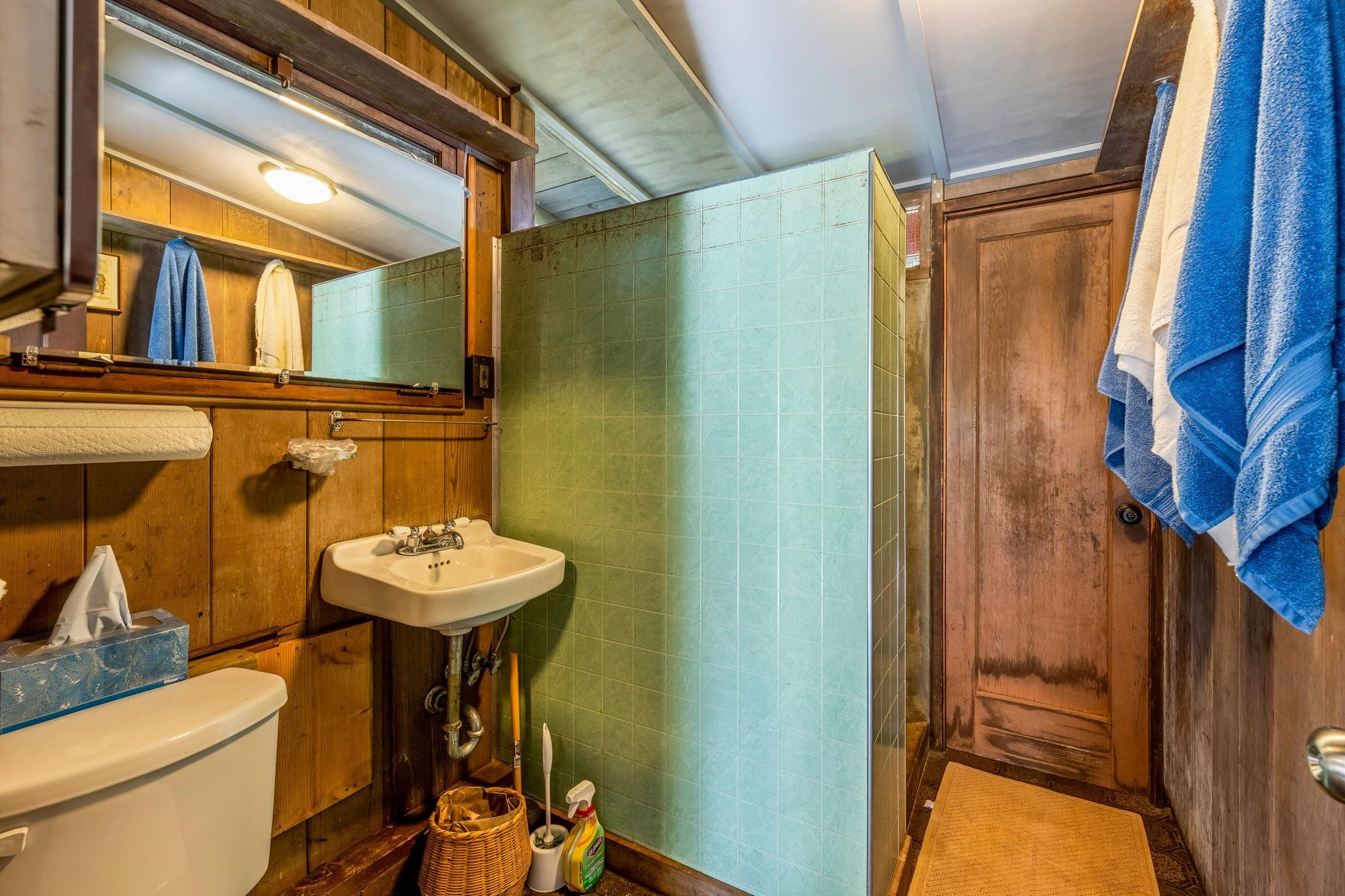 2640 Olinda Road Makawao, HI 96768 - Photo 13 of 49 a bathroom with a sink toilet and a mirror