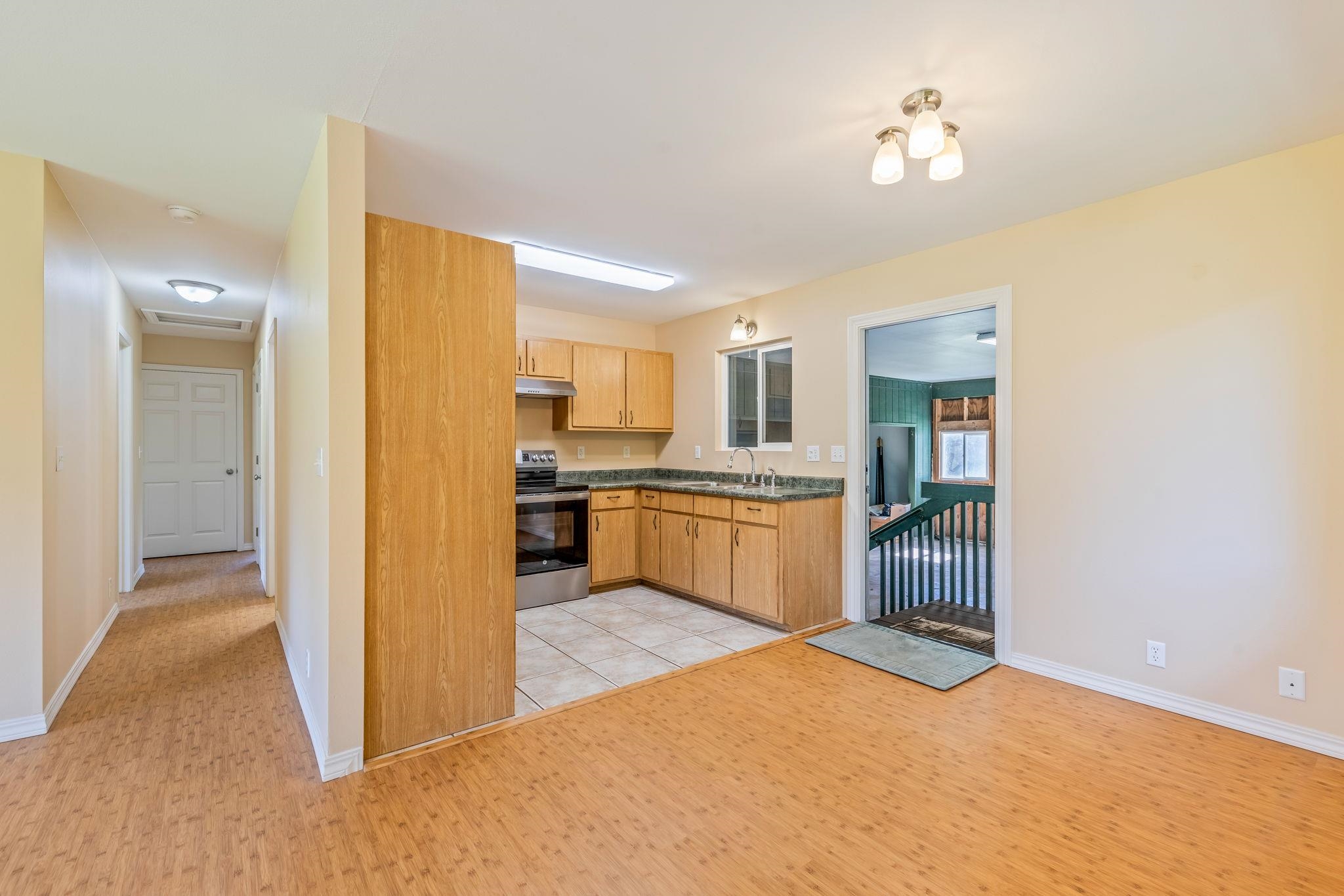 2640 Olinda Road Makawao, HI 96768 - Photo 41 of 49 a view of a kitchen with wooden floor and a kitchen