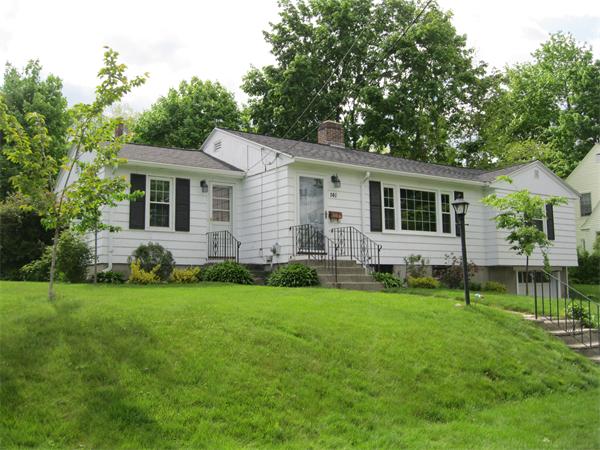 140 Bay State Road Worcester, MA 01605 - Photo 2 of 17 a backyard of a house with potted plants and large tree
