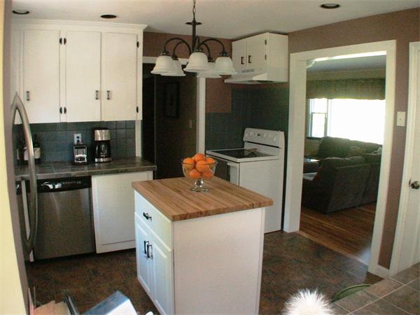 140 Bay State Road Worcester, MA 01605 - Photo 7 of 17 a kitchen with stainless steel appliances granite countertop a refrigerator a stove and a sink