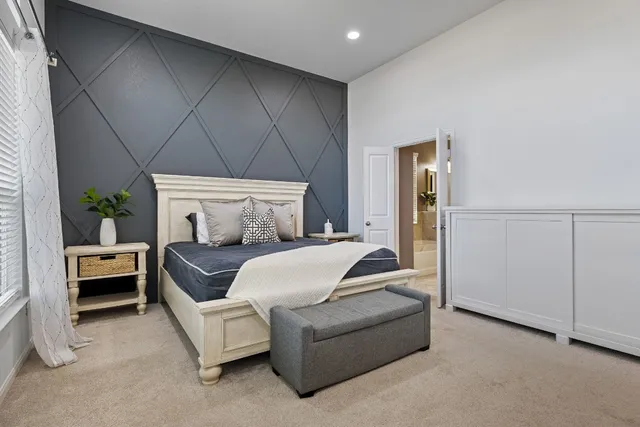 a bedroom with furniture and a couch